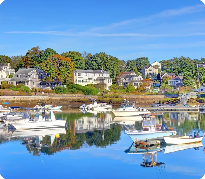 Scenic waterfront with boats and houses